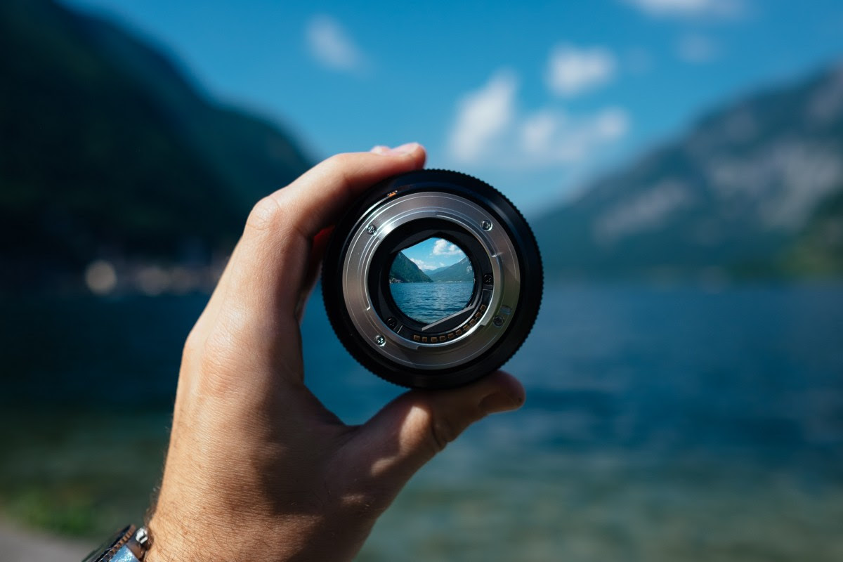 lens camera lens focus focusing hand holding lens photography aperture photographer d