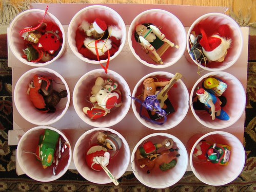 xmas ornaments nestled in bed