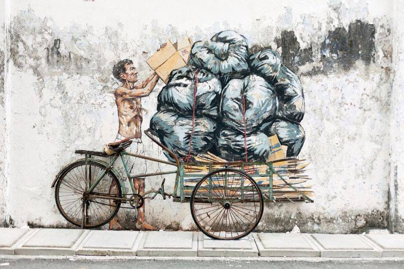 Whimsical New Murals by Ernest Zacharevic Play with Their Surroundings on the Streets of Malaysia street art murals Malaysia 