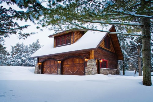 This charming barn-style garage is picture perfect in the snow! It ...