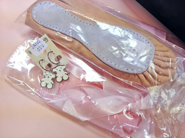We got her new shoes, a skirt, and I spied some cute teddy bear earrings