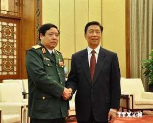 Phó Chủ tịch Trung Quốc Lý Nguyên Triều và Bộ trưởng Quốc phòng Phùng Quang Thanh. (Nguồn: TTXVN)