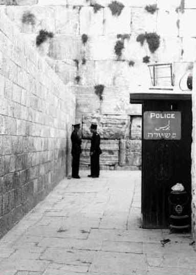 The narrow Western Wall alley, 1933. The Jews fought for their right to pray at the Western Wall of the Temple Mount compound. The libel accused them of seeking to topple the Temple Mount mosques. (Zoltan Kluger, Government Press Office)