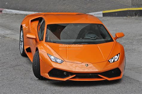 spyshots orange lamborghini huracan street racing