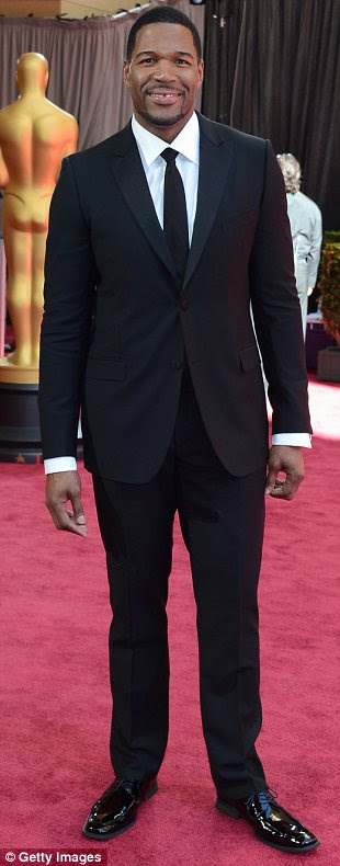 Men of the moment: (L-R) Eddie Redmayne, Jason Schwartzman and Michael Strahan were all looking suave as they made their entrances
