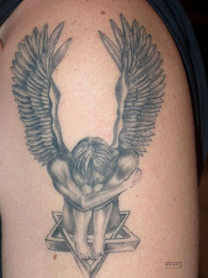 wings on the ack angel cross tattoos with wings on back. wings on the ack angel