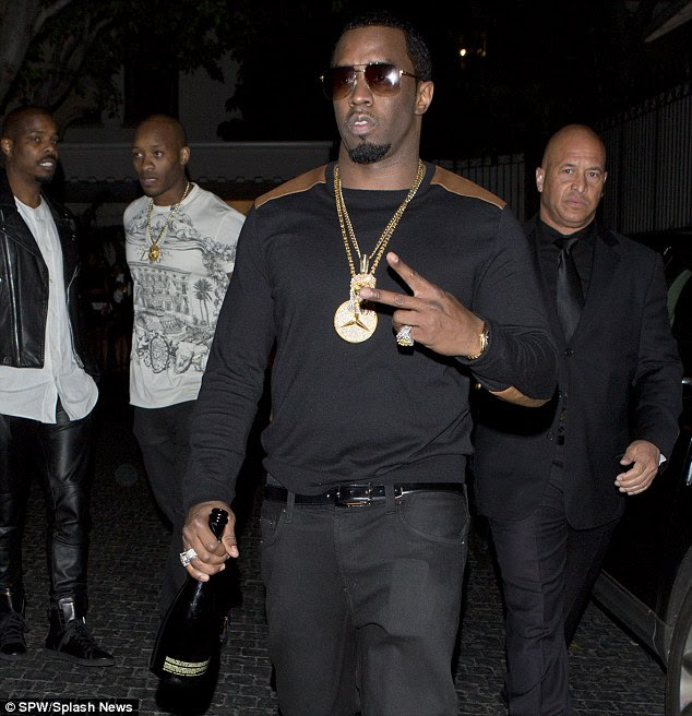 Friends to the end: Sean 'P Diddy' Combs, pictured here at Robin Thicke's birthday in Hollywood this week, was with the rapper when he was shot