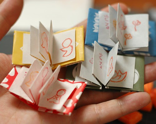 Miniature books with Sarubobo stamps