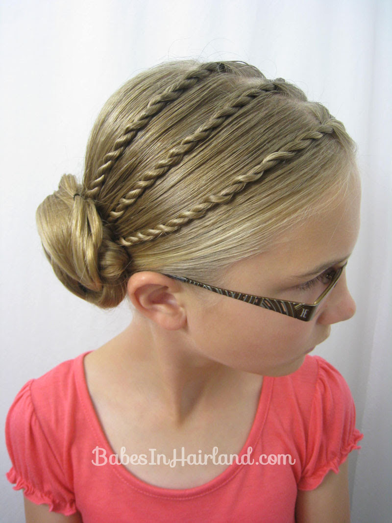 Image of Twisted bun hairstyle for school