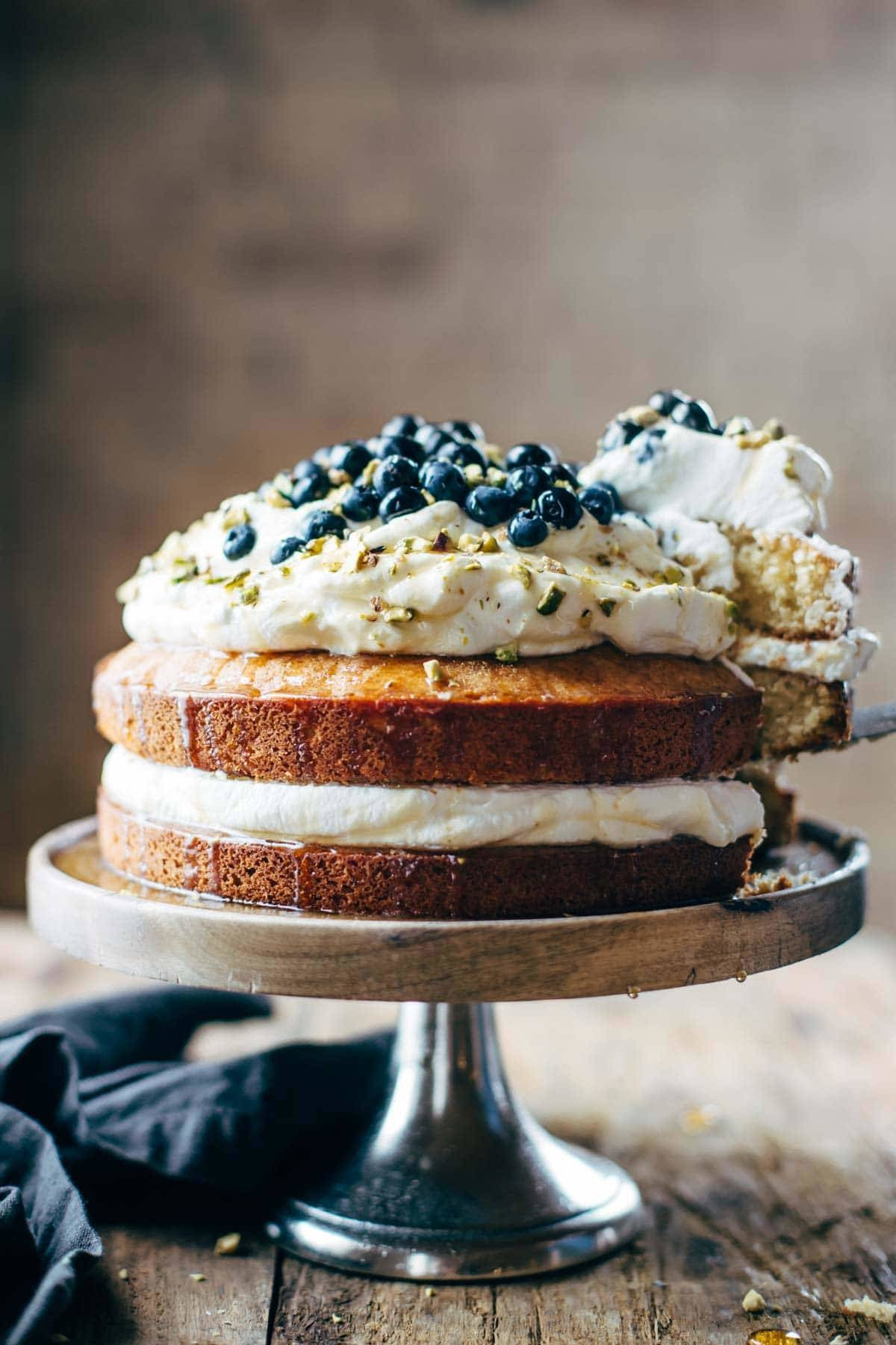 Orange Brunch Cake - SUPER YUMMY because it's made with olive oil and whole oranges! topped with whipped cream and blueberries and you're in fancy brunch business. | pinchofyum.com