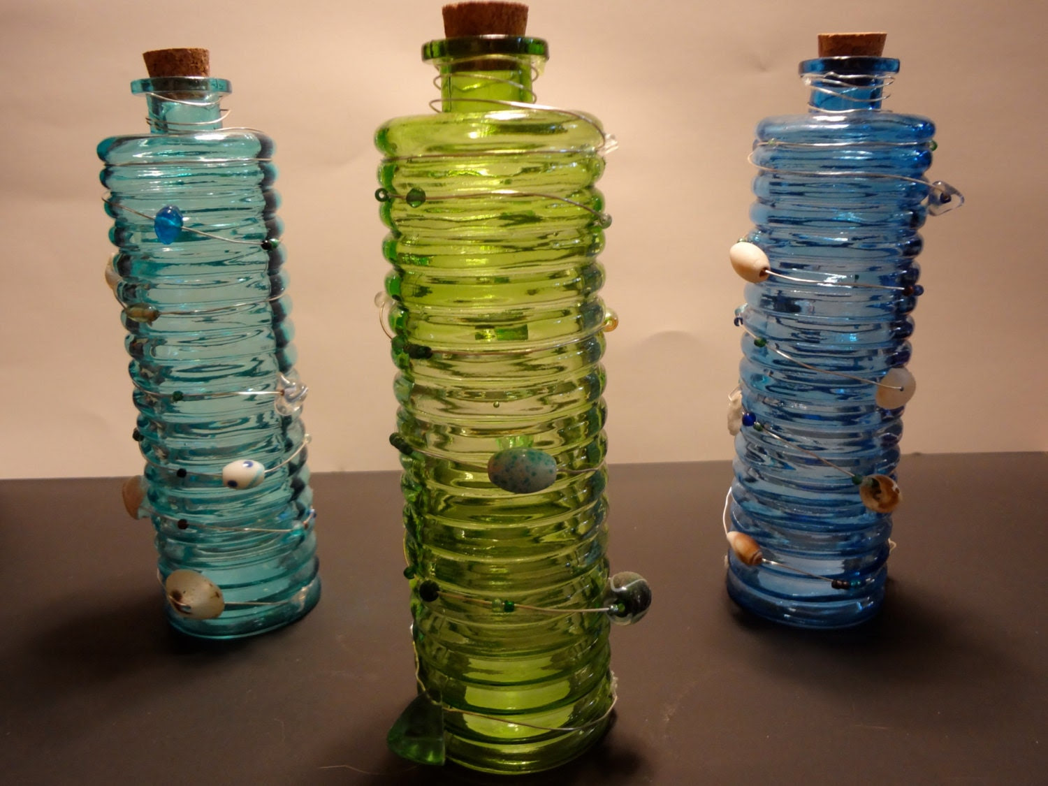 Items similar to Wire wrapped colored glass decorative ...