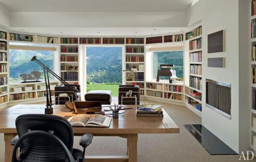 a summer house in mountain with a home office filled with books: spectacular!