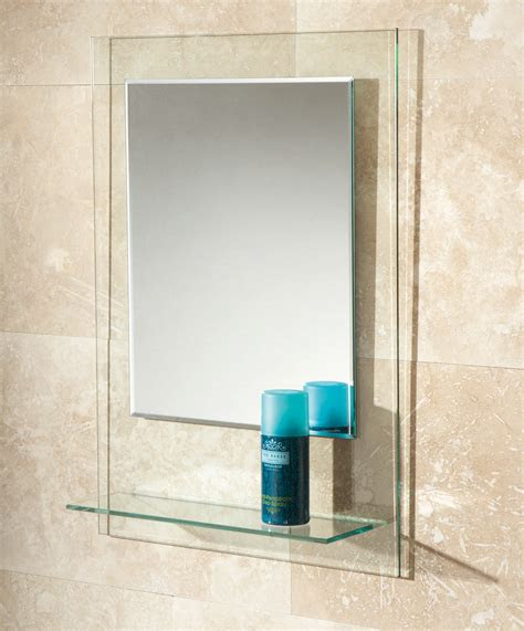 Most people like a nice hot shower or bath, but that usually results in a steamy mirror. HIB Fuzion Bevelled Edge Mirror With Glass Shelf | 72300100
