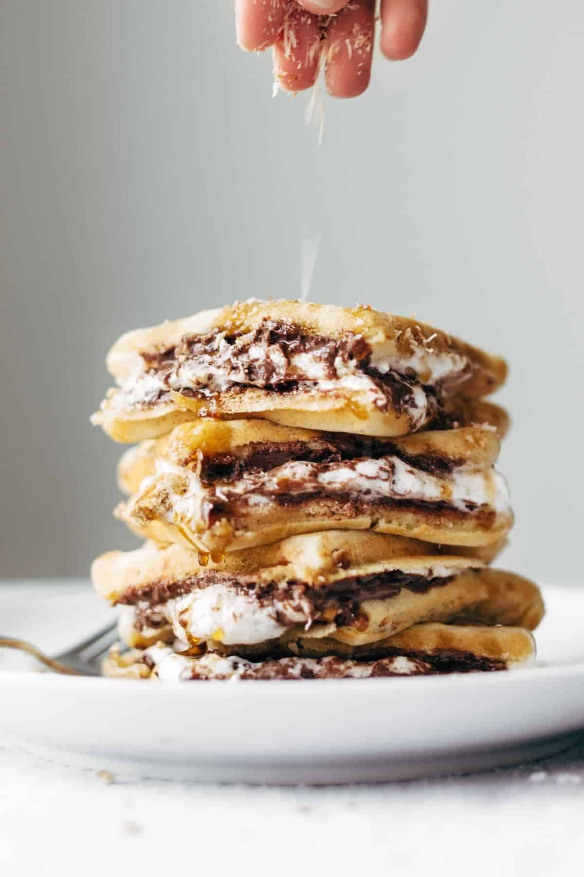 Smores Waffles with Nutella and Toasted Coconut - HELLO LOVER. brunch dreams coming true! | pinchofyum.com