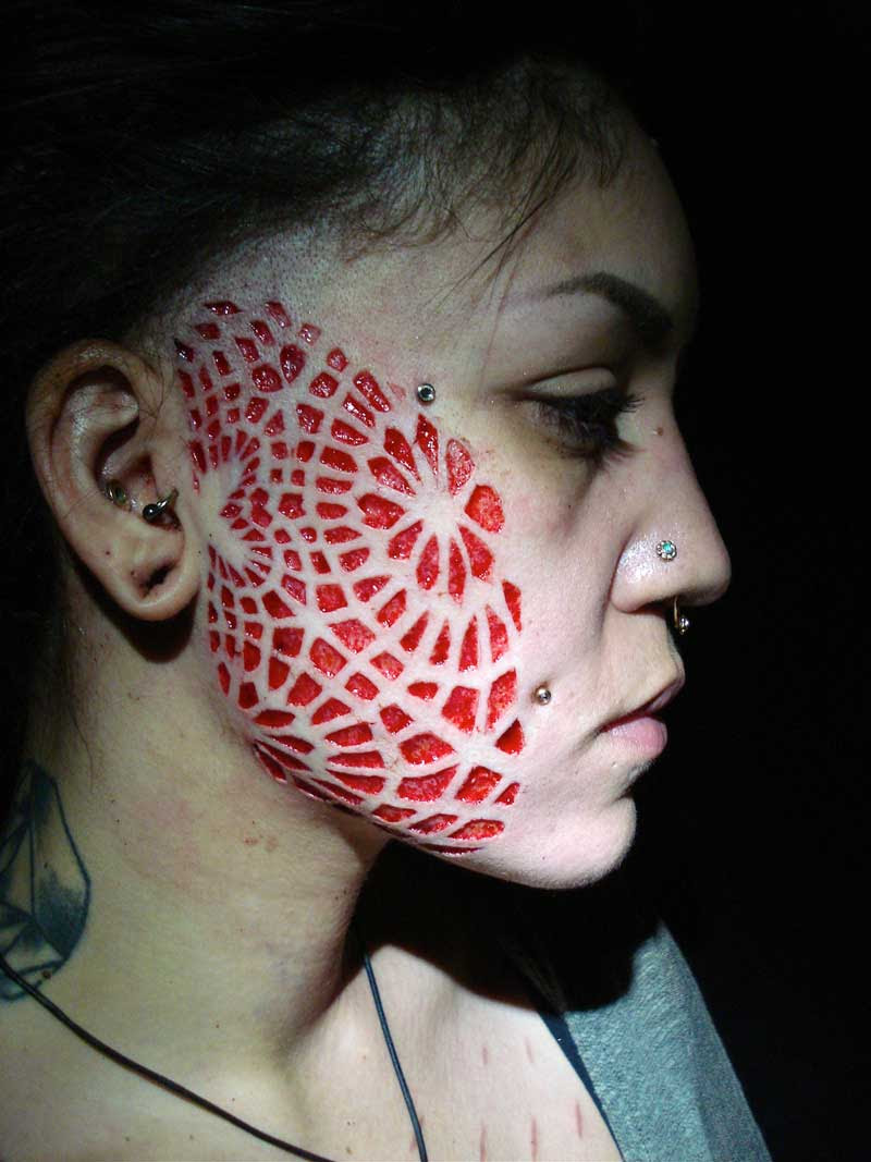 Facial scarification - Weird Picture Archive