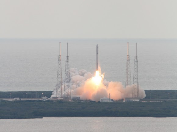 Falcon 9 SpaceX CRS-2 launch of Dragon spacecraft on March 1, 2013 to the ISS from pad 40 at Cape Canaveral, Florida.- shot from the roof of the Vehicle Assembly Building.   During 2014, SpaceX plans  two flight tests simulating Dragon emergency abort scenarios launching from pad 40. Credit: Ken Kremer/www.kenkremer.com