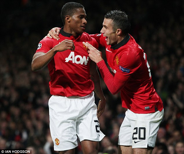 All over bar the shouting: Van persie congratulates Valencia after his strike sealed the match