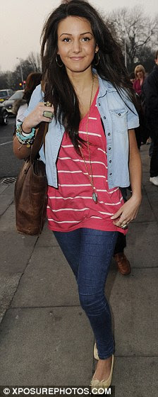 Supporting act: Michelle raced over to the Manchester Apollo last night to support her boyfriend's band