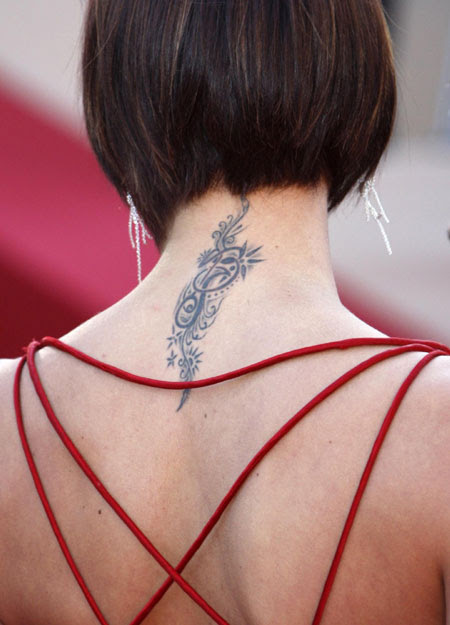Special Coverage:62nd Cannes Film Festival. A tattoo is seen on the neck of Special Coverage:62nd Cannes Film Festival. A tattoo is seen on the neck of