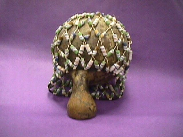 This Shekere is an African rattle used as a musical instrument.