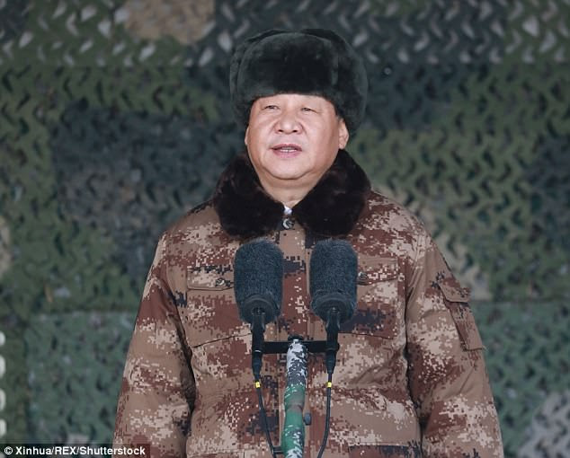 Chinese President Xi Jinping, also the chairman of China's Central Military Commission, is pictured issuing the order at a mobilisation meeting yesterday in Baoding, Hebei Province