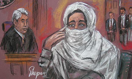 A courtroom sketch of Aafia Siddiqui with Judge Richard Berman in New York.