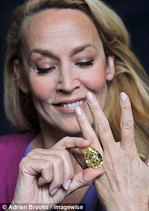 Model Jerry Hall is dazzled by the arrival of the Cora Sun-Drop