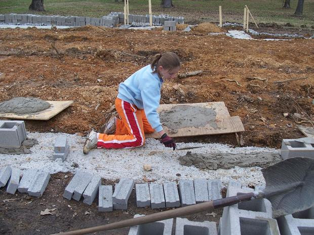 Jada, 11, working on the foundation.