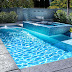 Swimming Pool Water Feature Ideas - Rock swimming pool water features bring nature to you, like in this outdoor oasis:
