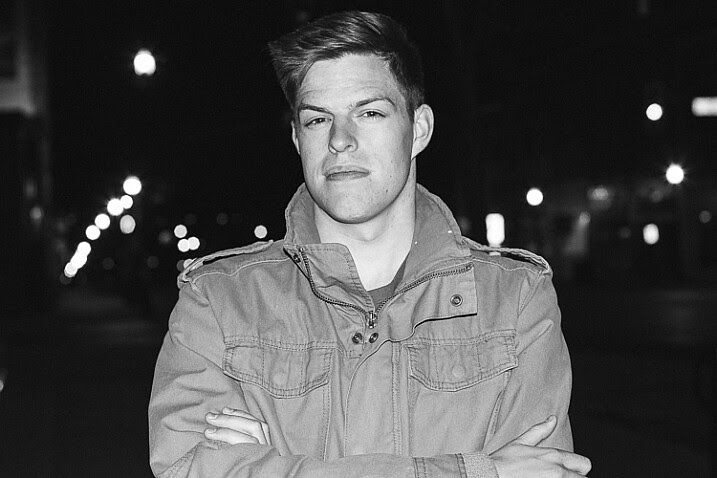 A man photographed in the city, lit by on-camera flash - How to Use a Cell Phone for Dramatic Night Photography