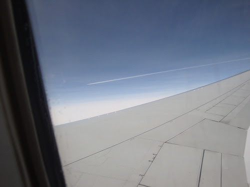 Neighbors airplane window flying flight