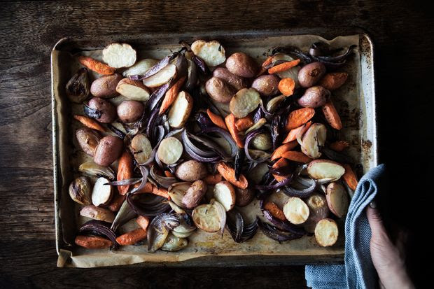 roasted potatoes carrots and onions / Photo by David Cicconi, food styling by Kemp Minifie, prop styling by Brian Heiser