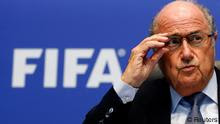 FIFA President Sepp Blatter addresses the media after a meeting of the executive committee in Zurich October 4, 2013. FIFA members need more time to decide whether the 2022 World Cup in Qatar should be staged outside the traditional June-July period and a decision is unlikely on Friday, CONCACAF president Jeffrey Webb said on Friday. Reuters/Arnd Wiegmann (SWITZERLAND - Tags: SPORT SOCCER HEADSHOT TPX IMAGES OF THE DAY)