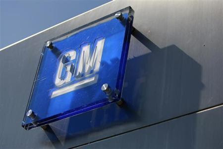 The General Motors logo is seen outside its headquarters at the Renaissance Center in Detroit, Michigan in this file photograph taken August 25, 2009. REUTERS/Jeff Kowalsky/Files