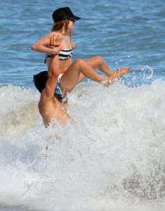 Avril Lavigne nip slip at the beach in Malibu