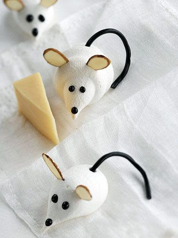 Cute L'il Meringue Mice  These fluffy mice are as simple to make as they are cute. Almond slivers make the ears, licorice forms the tail, and chocolate decorating gel is all you need to create the eyes and nose.  See Cute Cute L'il Meringue Mice recipe