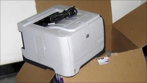 Photo released by Dubai police of what they said was printer containing ink cartridge loaded with bomb - released 30 October 2010