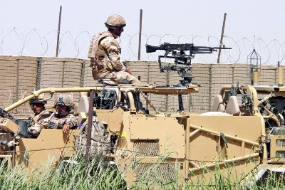 Tropas da NATO em Kandahar, 7 de Junho de 2010 – Foto de Humayoun Shiab/Epa/Lusa