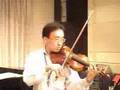 Adult beginner plays violin