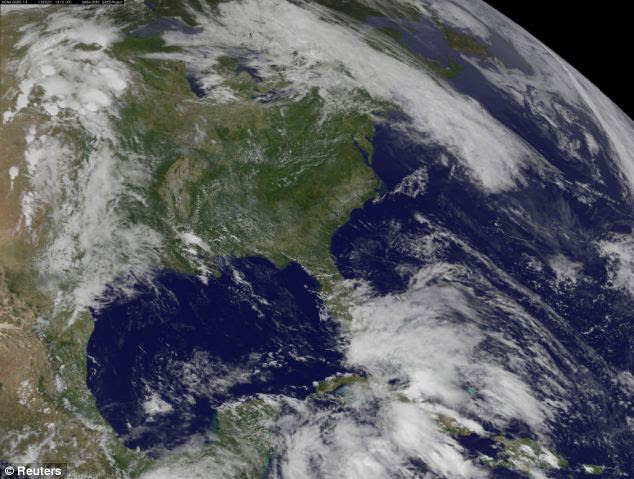 Tropical Storm Barbara became a hurricane in the Pacific as it neared Mexico's southern coast a