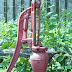 Antique Hand Water Pump Faucet / Add the musical sound of splashing water and you have a near perfect garden ornament.