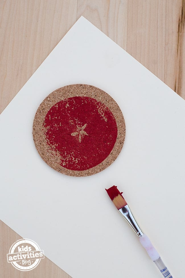 Making Apple Print Coasters is a fun craft to do with kids after visiting an apple farm. Kids will enjoy seeing the "star" on the inside of the apple, then stamping it onto a cork coaster to use as an ornament, gift, or coaster for home. This craft requires basic supplies and can be done at home, school, or daycare.