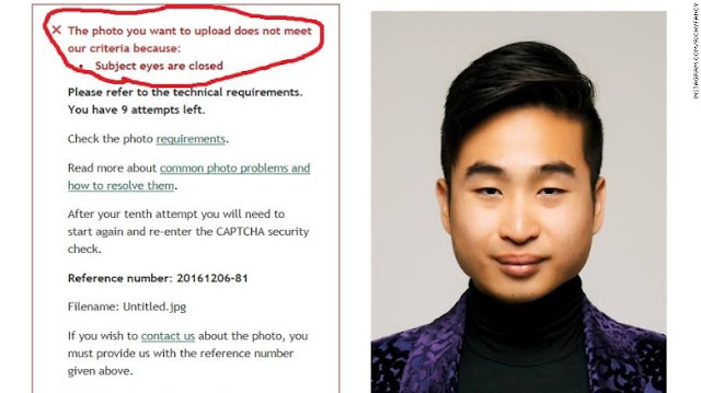 Passport robot rejects Asian man's passport for not opening his eyes