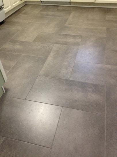 If you have vinyl flooring in your home, you've likely discovered how affordable, durable and easy to maintain it is. TrafficMASTER Ceramica 12 in. x 24 in. Coastal Grey