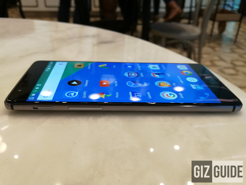 At left, there's a switch for alerts / notifications and a volume rocker