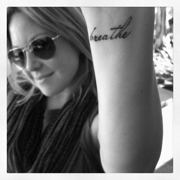 Brooke Hammerling shows off her "breathe" tattoo. Her firm does PR for tons 