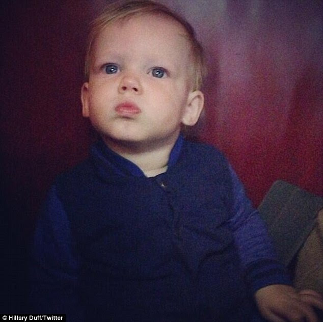 Pouting pose: Hilary Duff posted a Twitter snap of her young son Luca looking thoughtful on Wednesday 