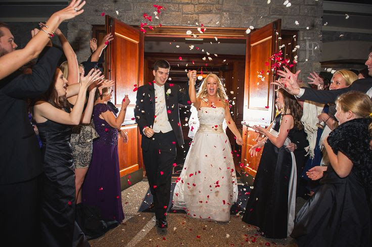 Fun wedding exit with rose petals!