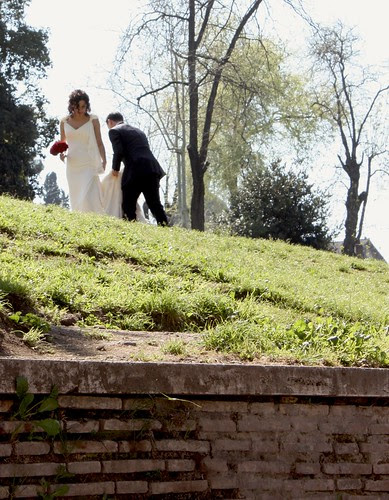 Newlyweds, getting their photos taken