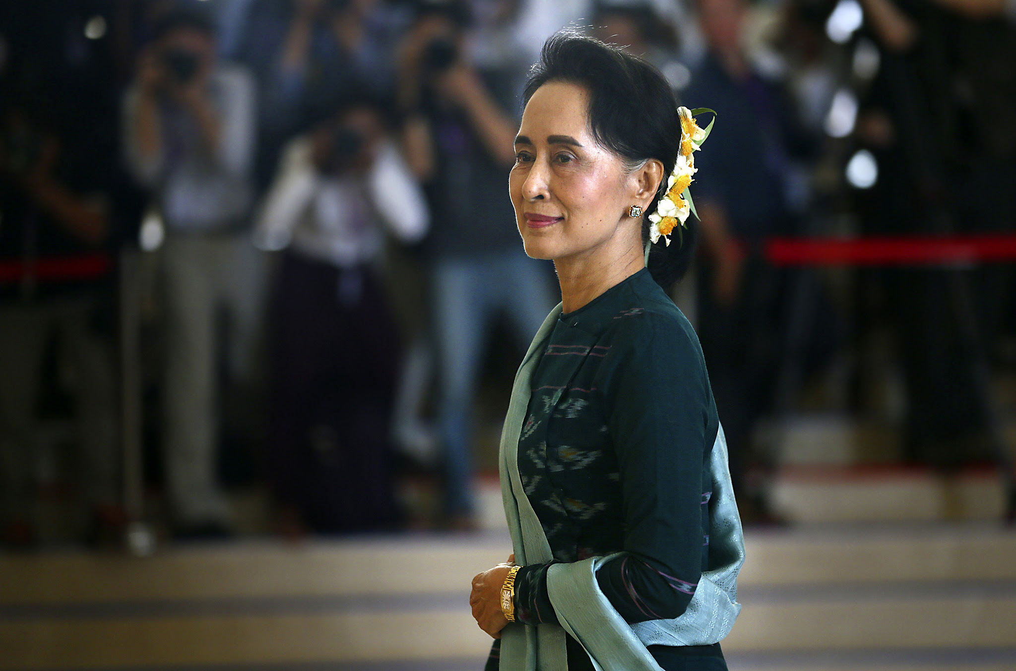 National League for Democracy party (NLD) leader Aung San Suu Kyi arrives in Manama's parliament in Naypyitaw, Myanmar, Tuesday, March 15, 2016. Myanmar's parliament votes Tuesday to pick the country's next president from a group of three final candidates, including a front runner who is a longtime confidant of Nobel laureate Suu Kyi. (AP Photo/Gemunu Amarasinghe)
